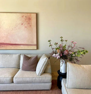 Sisu Flower seasonal subscription flowers styled in a living room