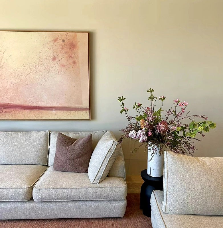 Sisu Flower seasonal subscription flowers styled in a living room